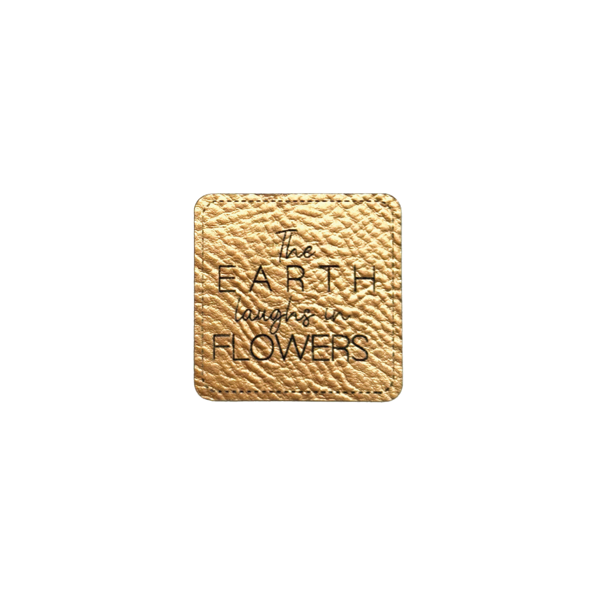 Faux leather label "The Earth laughs in Flowers"